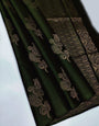 Delicate Dark Green Color Soft Lichi Silk Saree With Blouse Piece
