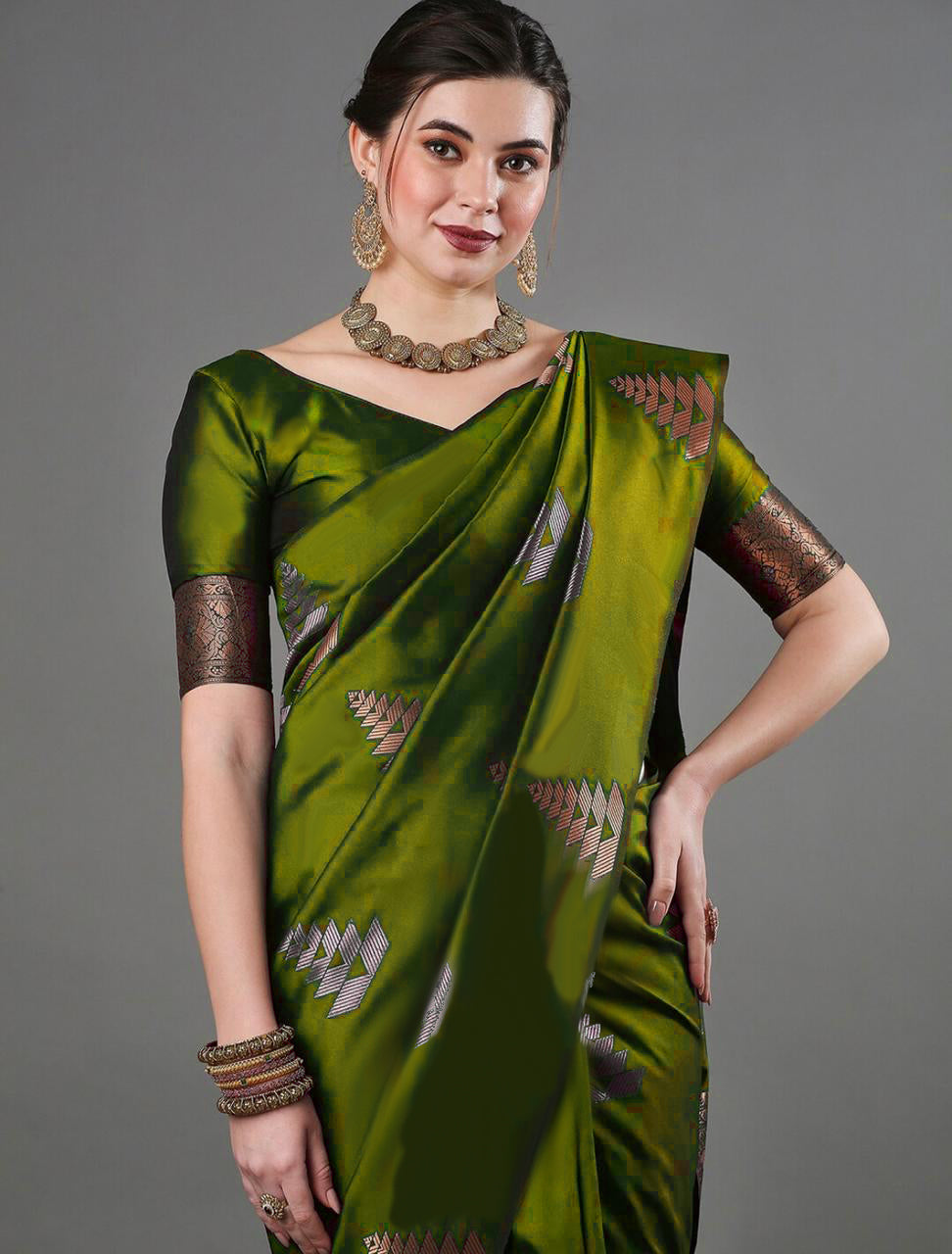 Iconic Mahndi Color Soft Lichi Silk Saree With Blouse Piece