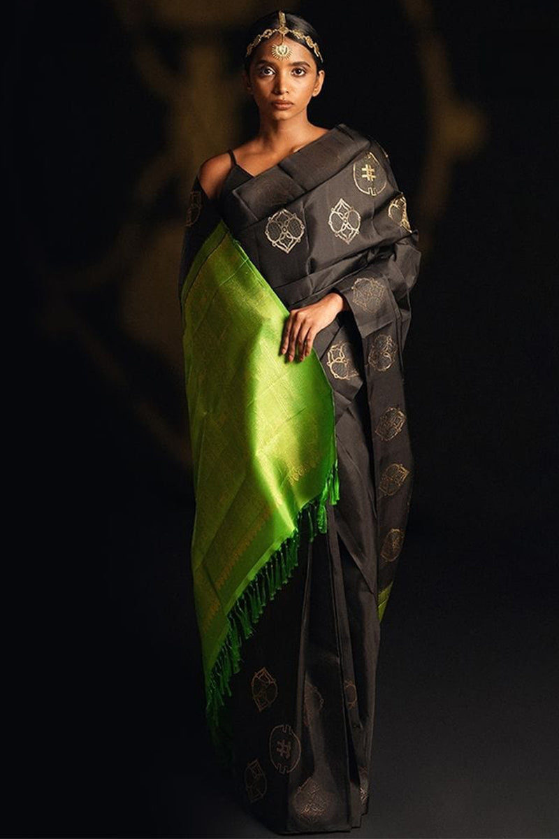 Vibrant Black Color Soft Lichi Silk Saree With Blouse Piece