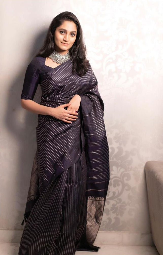 Seductive Black Color Soft Lichi Silk Saree With Blouse Piece