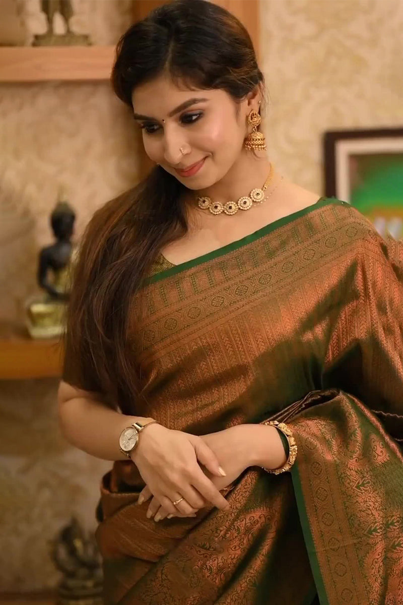 Devastating Dark Green Soft Silk Saree With Lassitude Blouse Piece