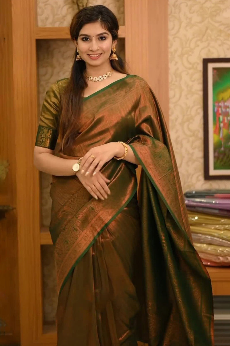 Devastating Dark Green Soft Silk Saree With Lassitude Blouse Piece