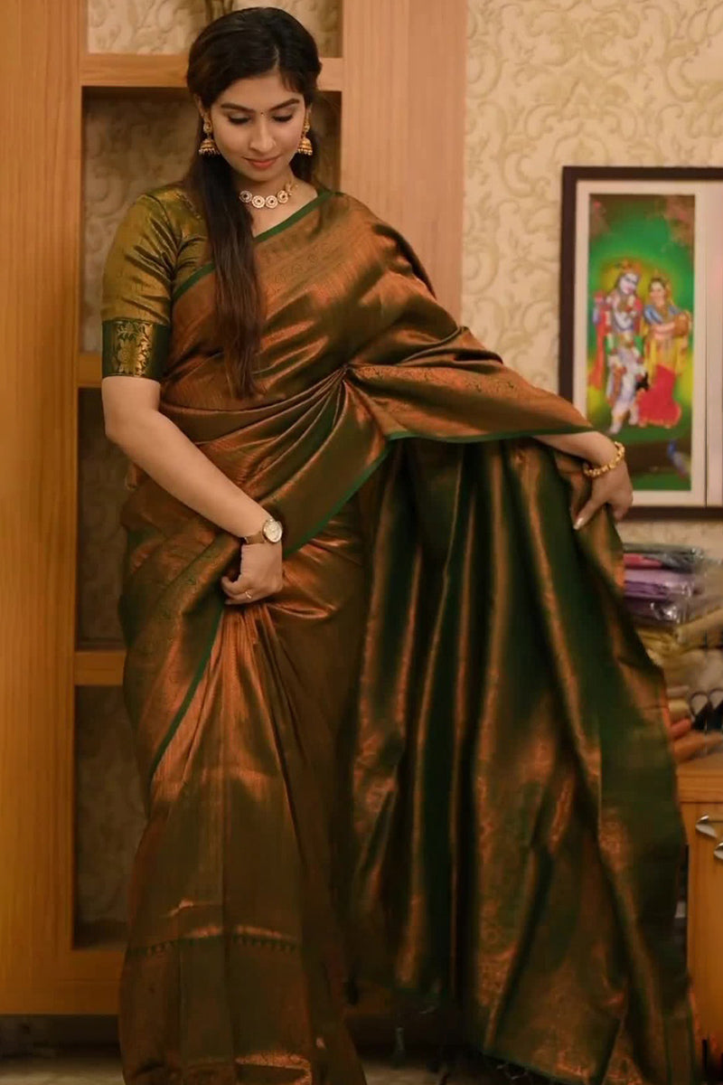 Devastating Dark Green Soft Silk Saree With Lassitude Blouse Piece