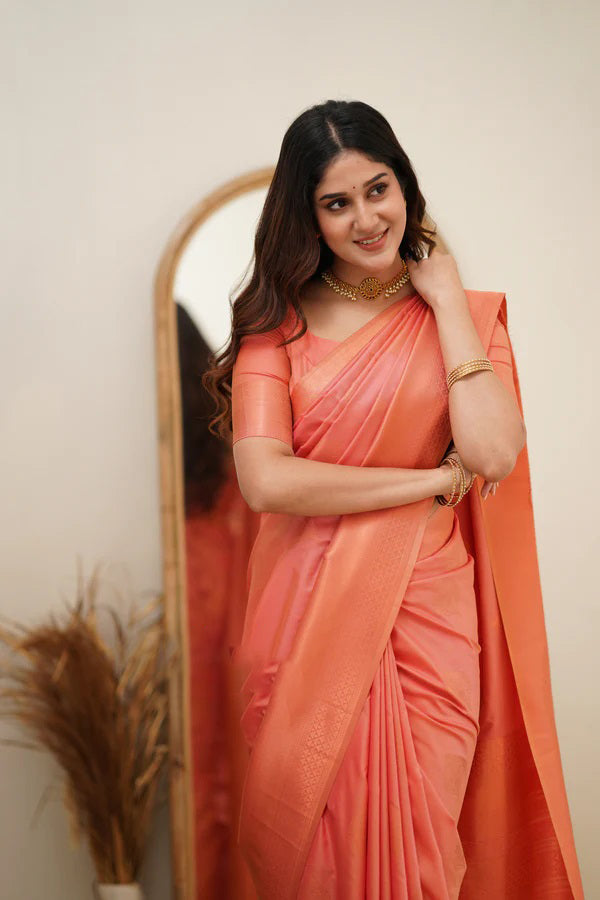 Dazzling Peach Color Soft Lichi Silk Saree With Blouse Piece