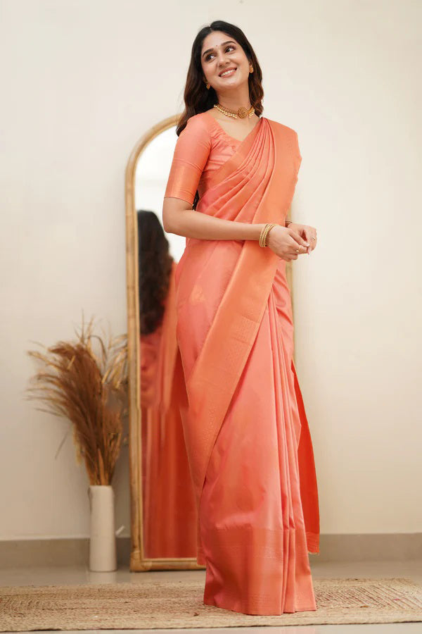 Dazzling Peach Color Soft Lichi Silk Saree With Blouse Piece