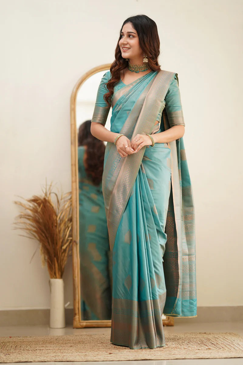 Stylish Turquoise Blue Color Soft Lichi Silk Saree With Blouse Piece