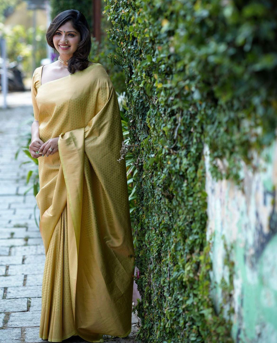 Dazzling Yellow Color Soft Lichi Silk Saree With Blouse Piece