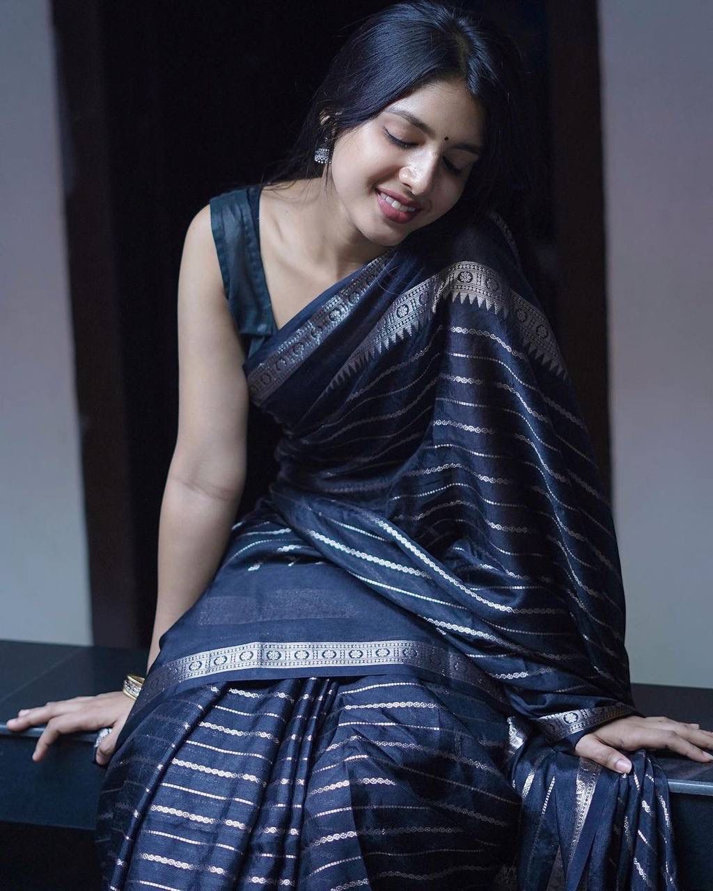 Voluptuous Black Color Soft Lichi Silk Saree With Blouse Piece