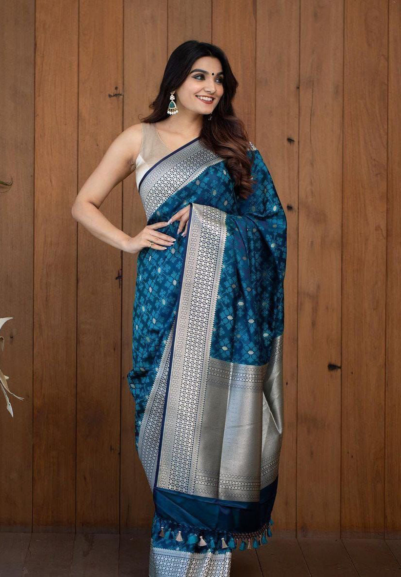 Ethereal Teal Blue Color Soft Lichi Silk Saree With Blouse Piece