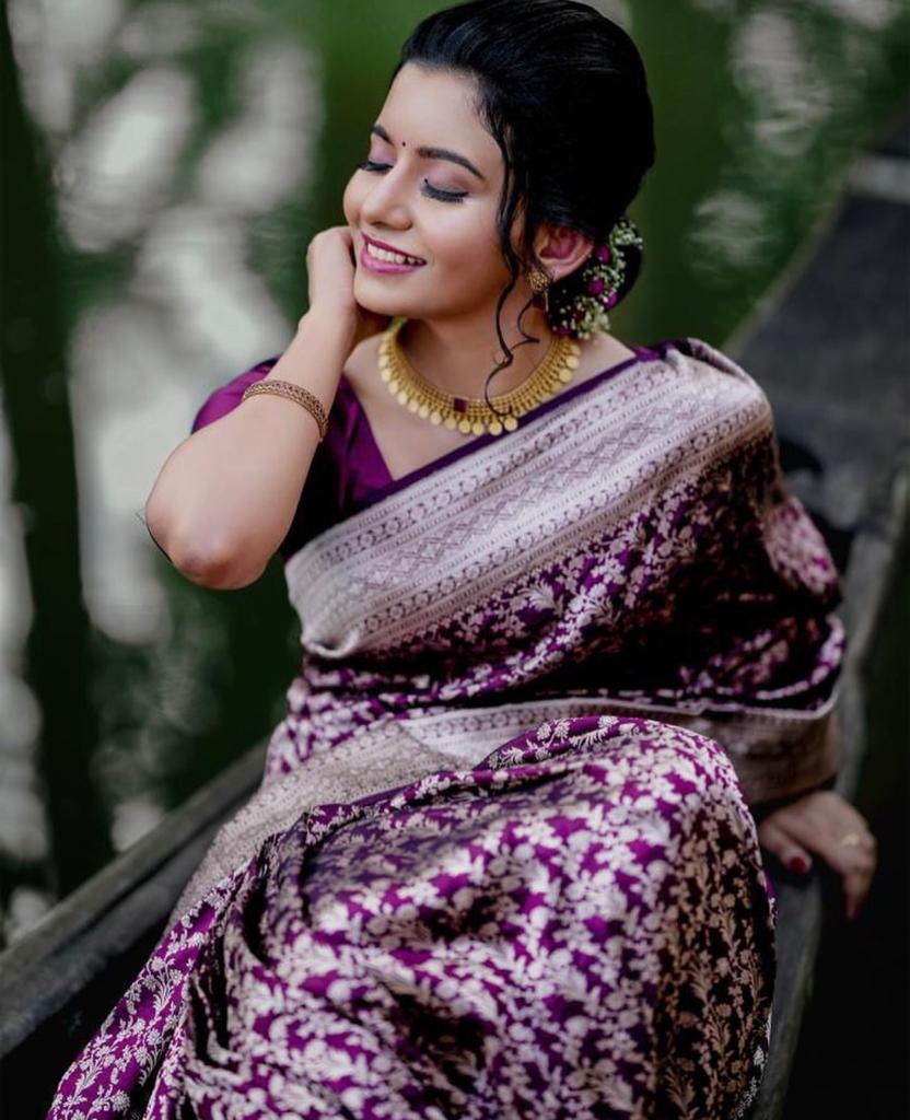 Captivating Purple Color Soft Lichi Silk Saree With Blouse Piece