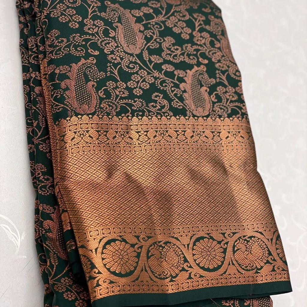 Radiant Dark Green Color Soft Lichi Silk Saree With Blouse Piece