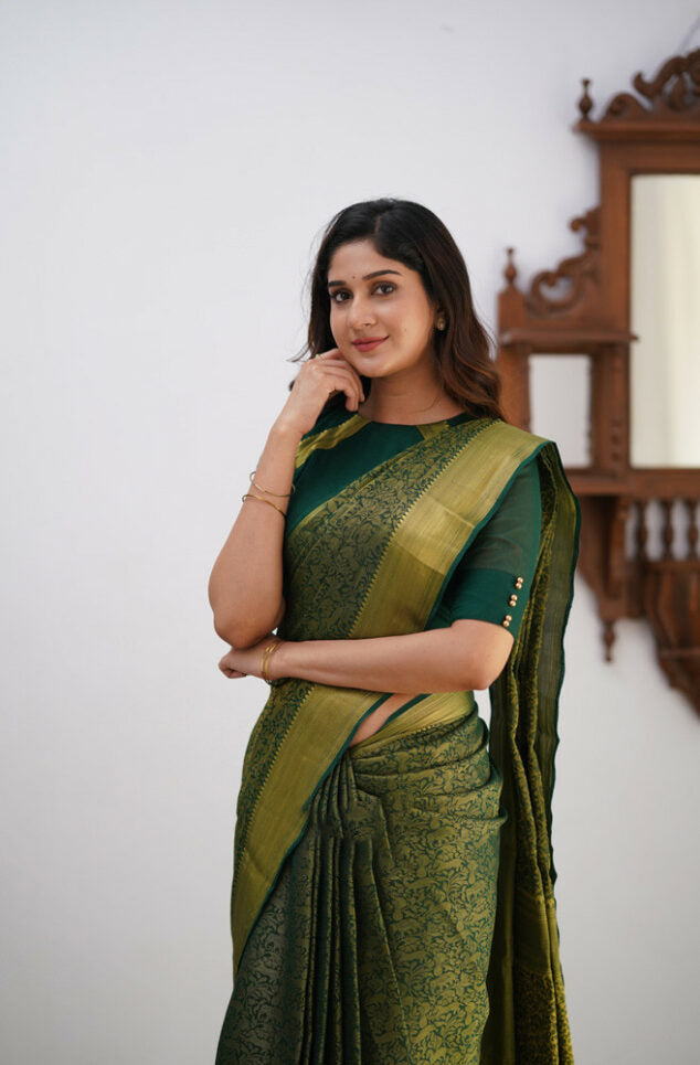 Divine Dark Green Color Soft Lichi Silk Saree With Blouse Piece