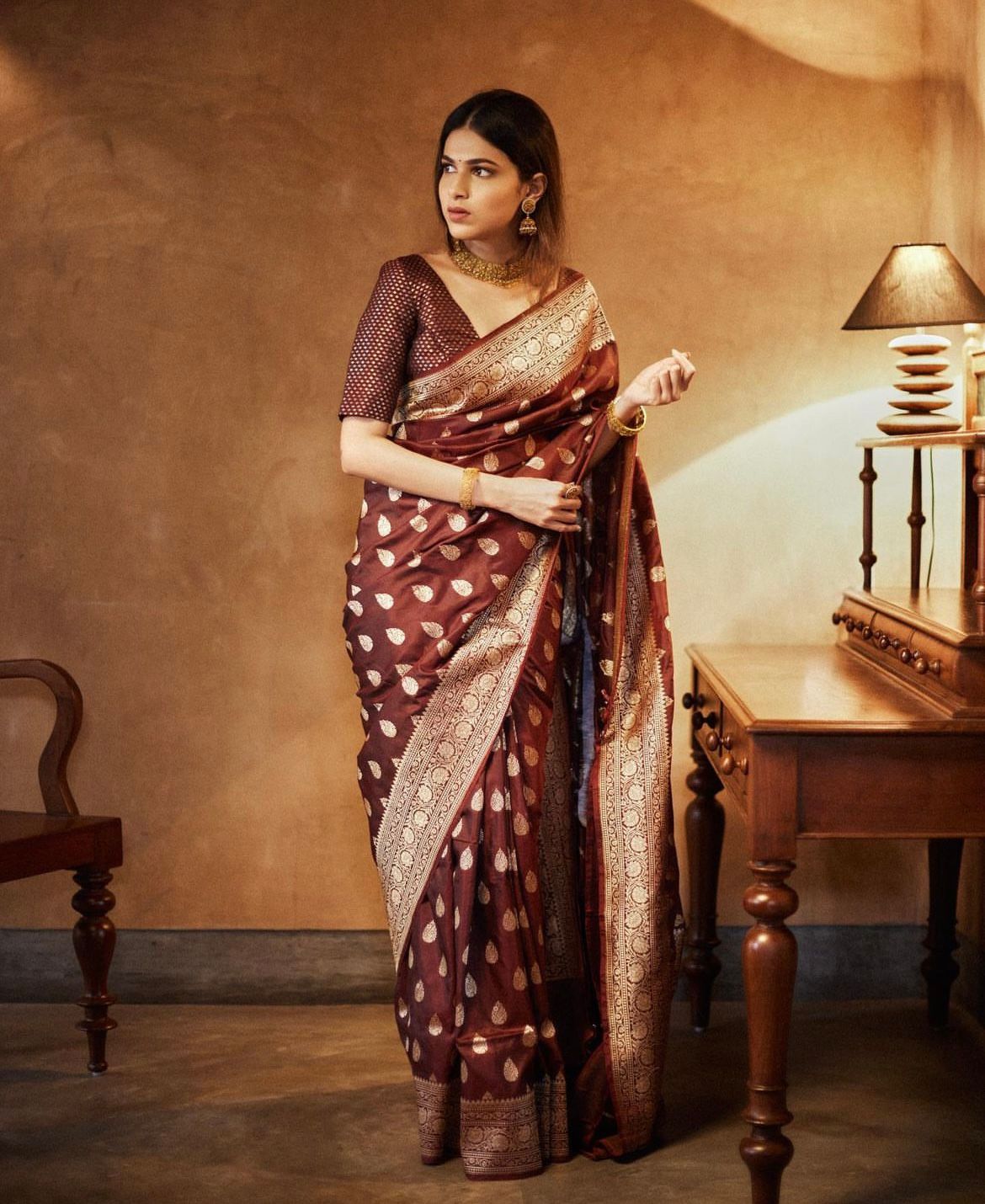 Enchanting Brown Color Soft Lichi Silk Saree With Blouse Piece