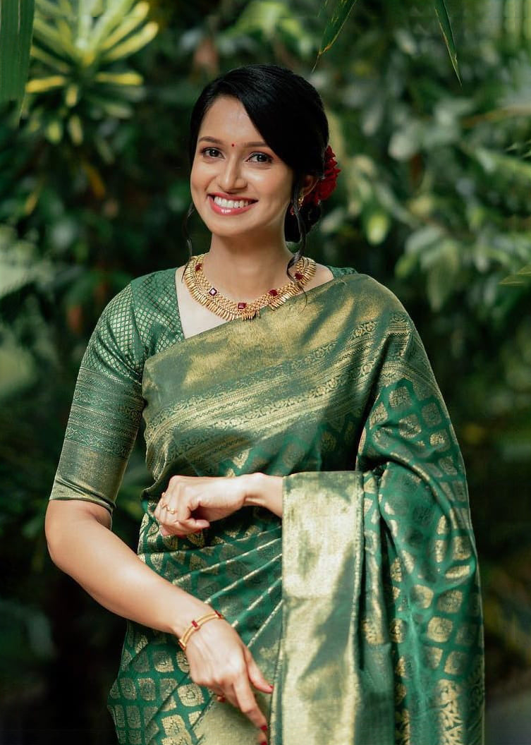 Luminous Rama Green Color Soft Lichi Silk Saree With Blouse Piece