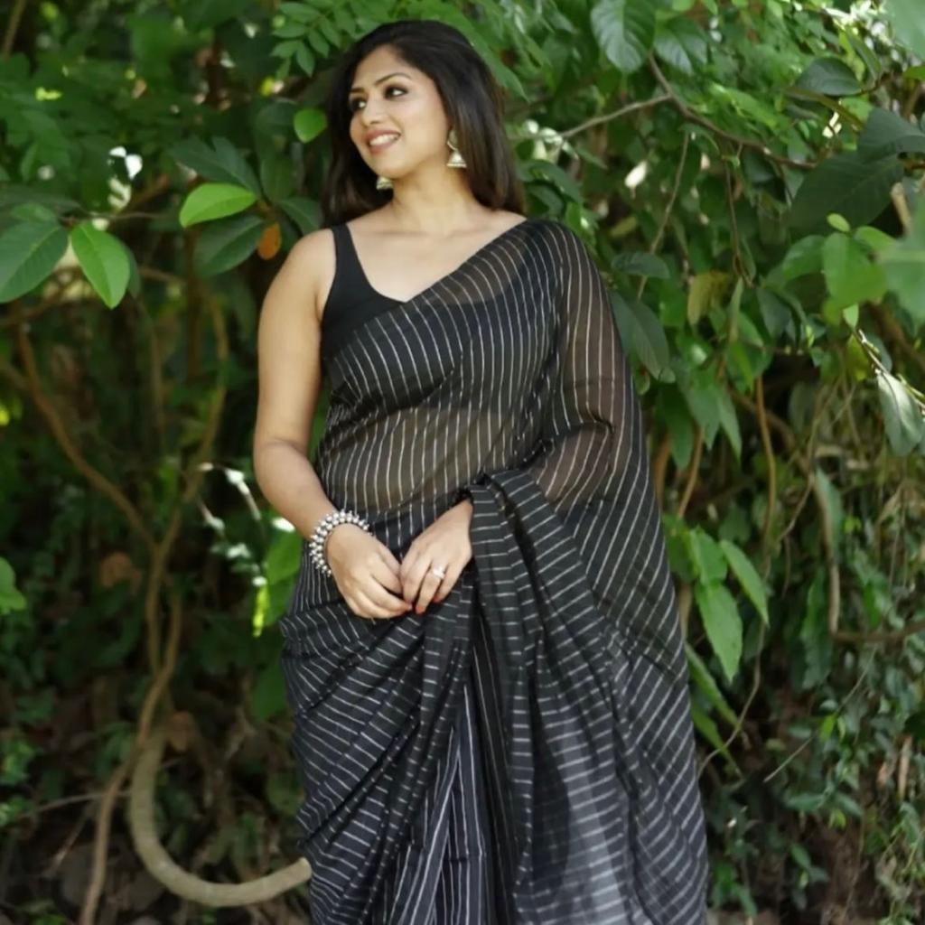 Mystical Black Color Soft Lichi Silk Saree With Blouse Piece