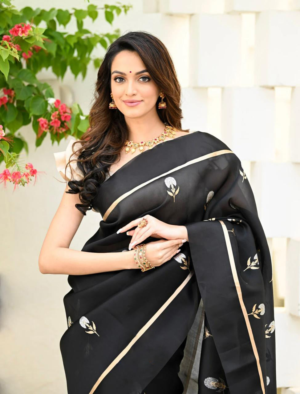 Dynamic Black Color Soft Lichi Silk Saree With Blouse Piece