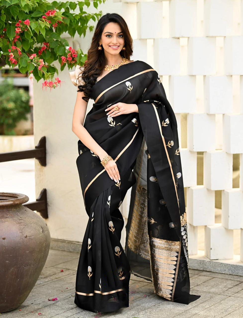 Dynamic Black Color Soft Lichi Silk Saree With Blouse Piece