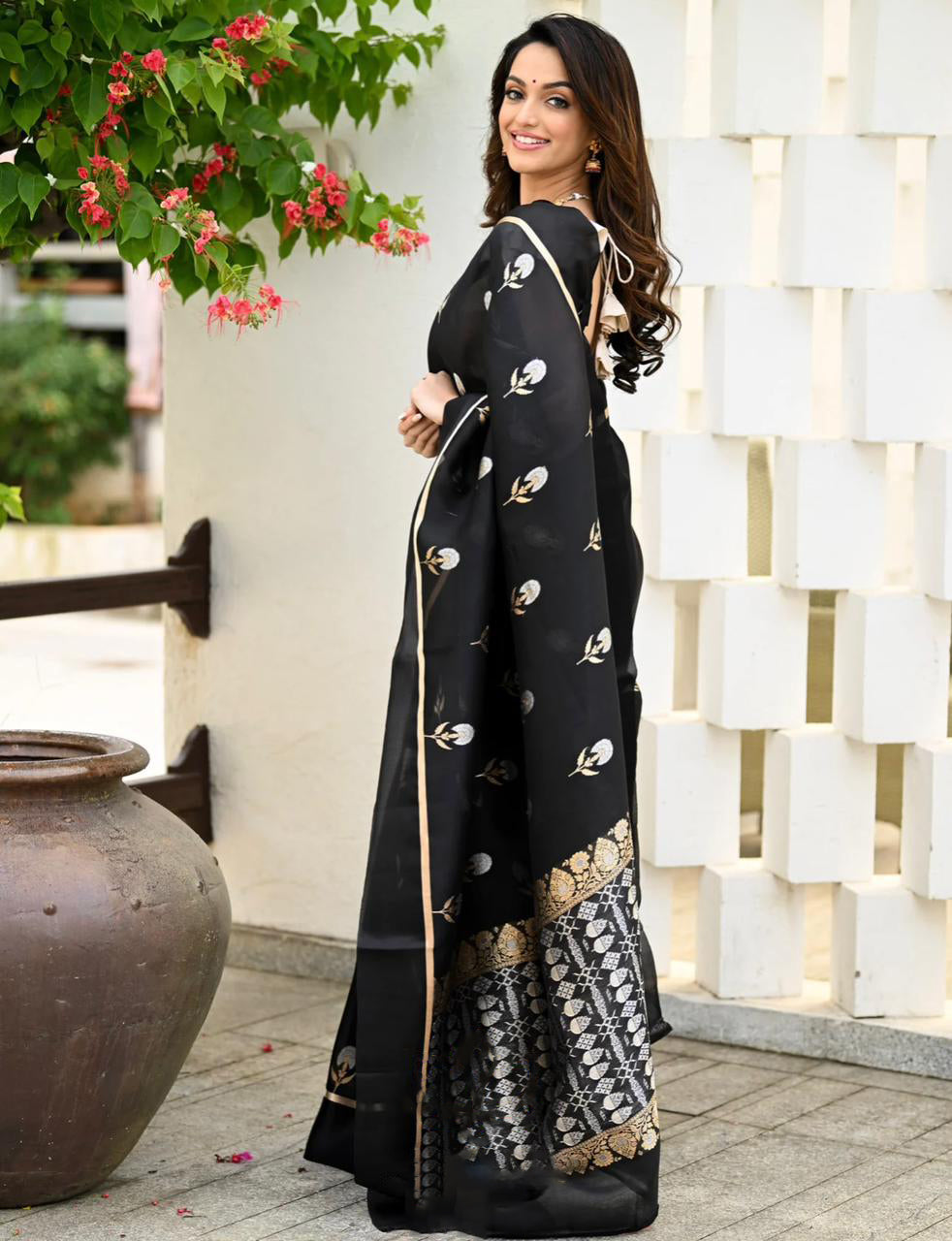 Dynamic Black Color Soft Lichi Silk Saree With Blouse Piece