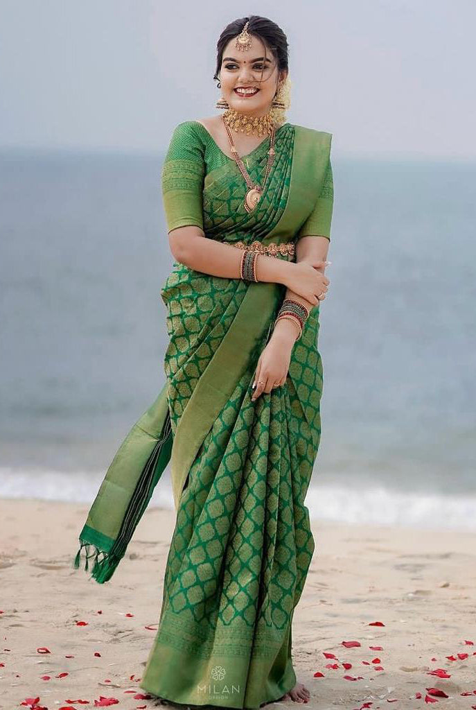 Smoldering Green Color Soft Lichi Silk Saree With Blouse Piece