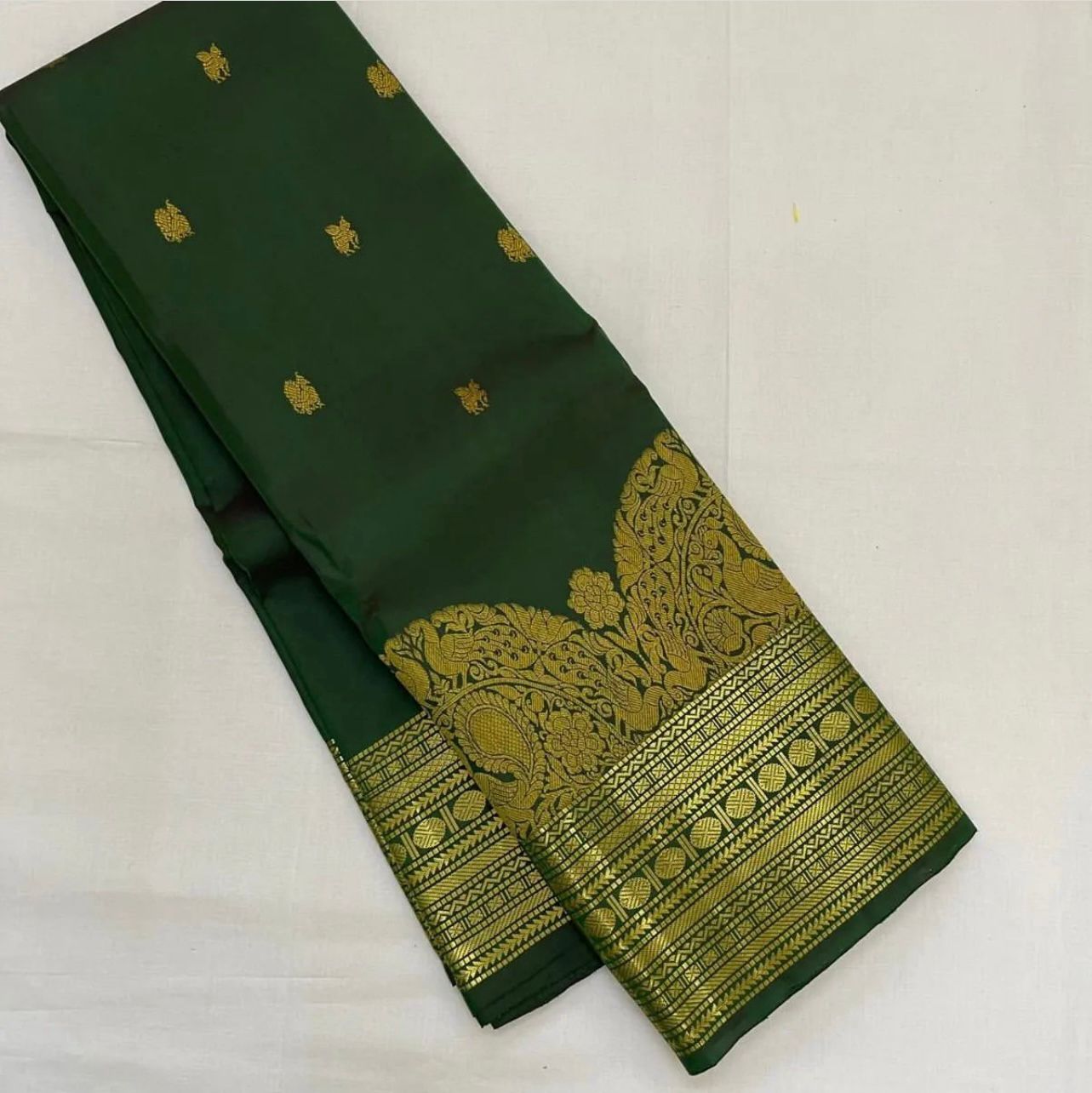 Flickering Dark Green Color Soft Lichi Silk Saree With Blouse Piece