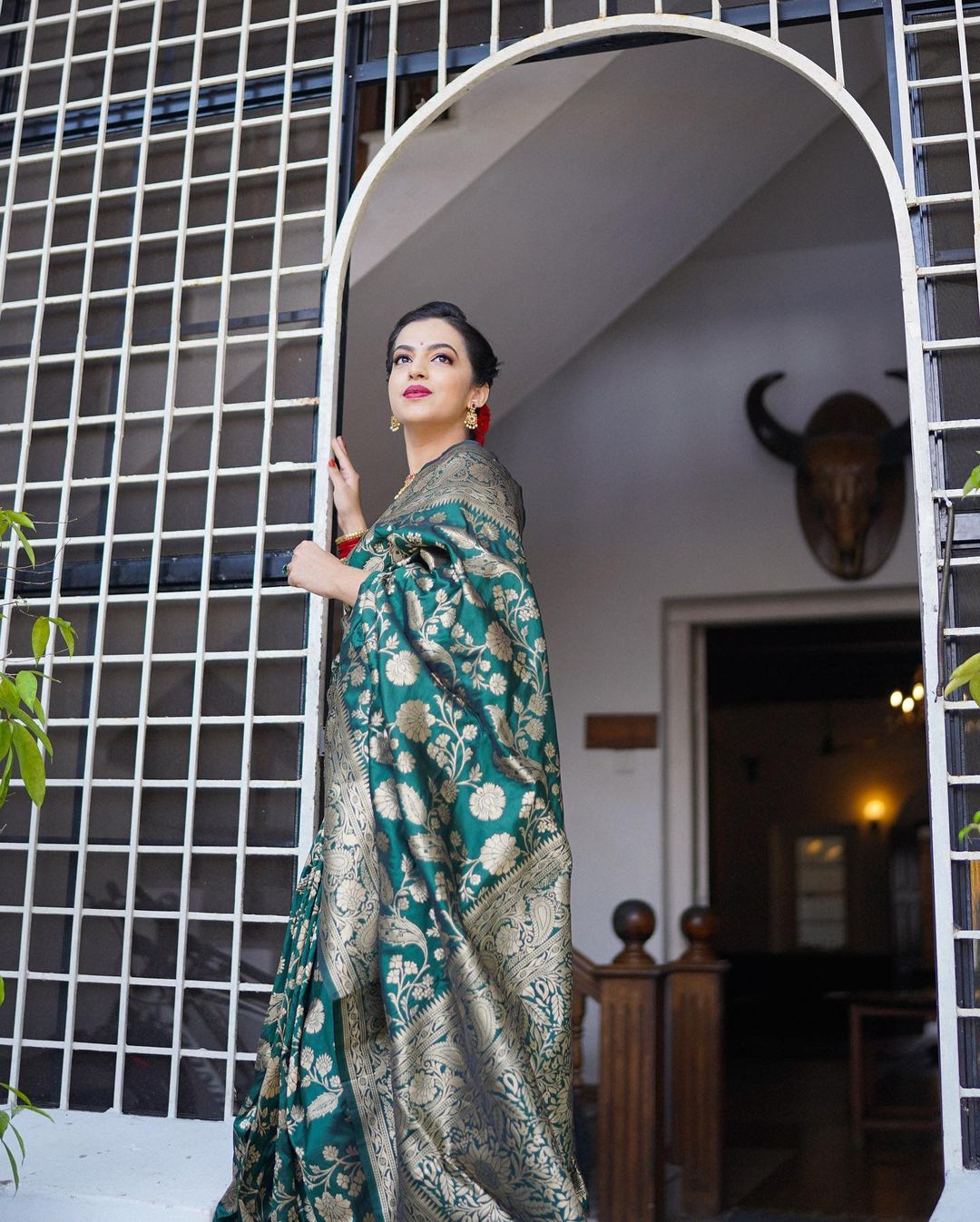 Glinting Dark Green Color Soft Lichi Silk Saree With Blouse Piece