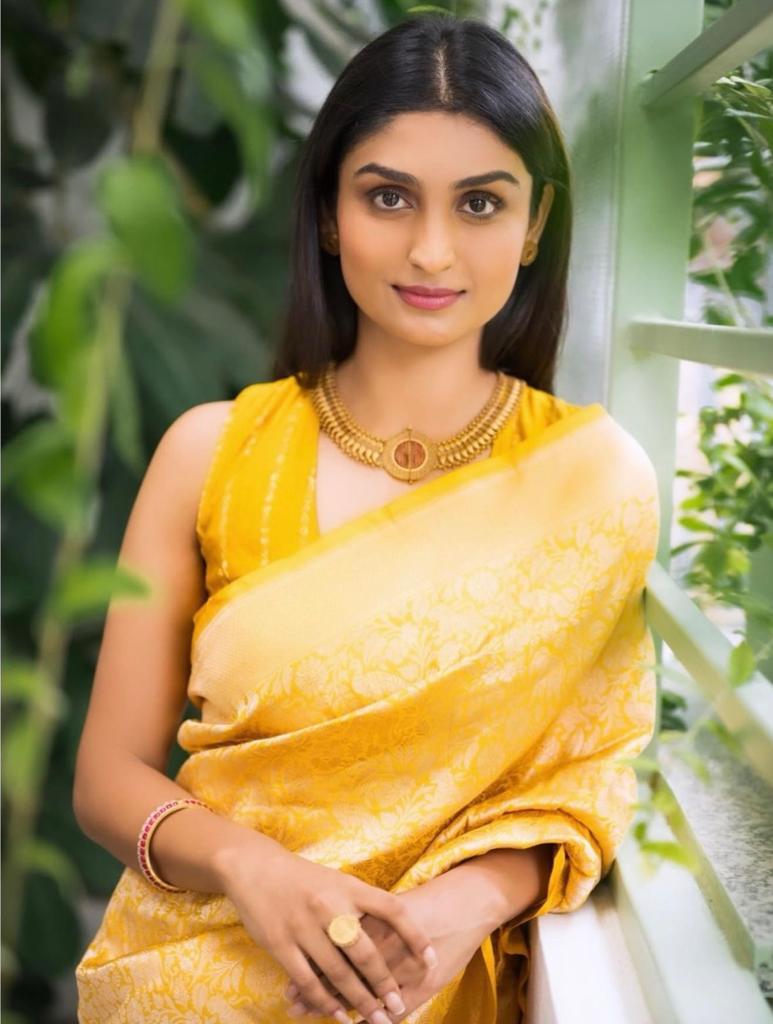 Exotic Yellow Color Soft Lichi Silk Saree With Blouse Piece