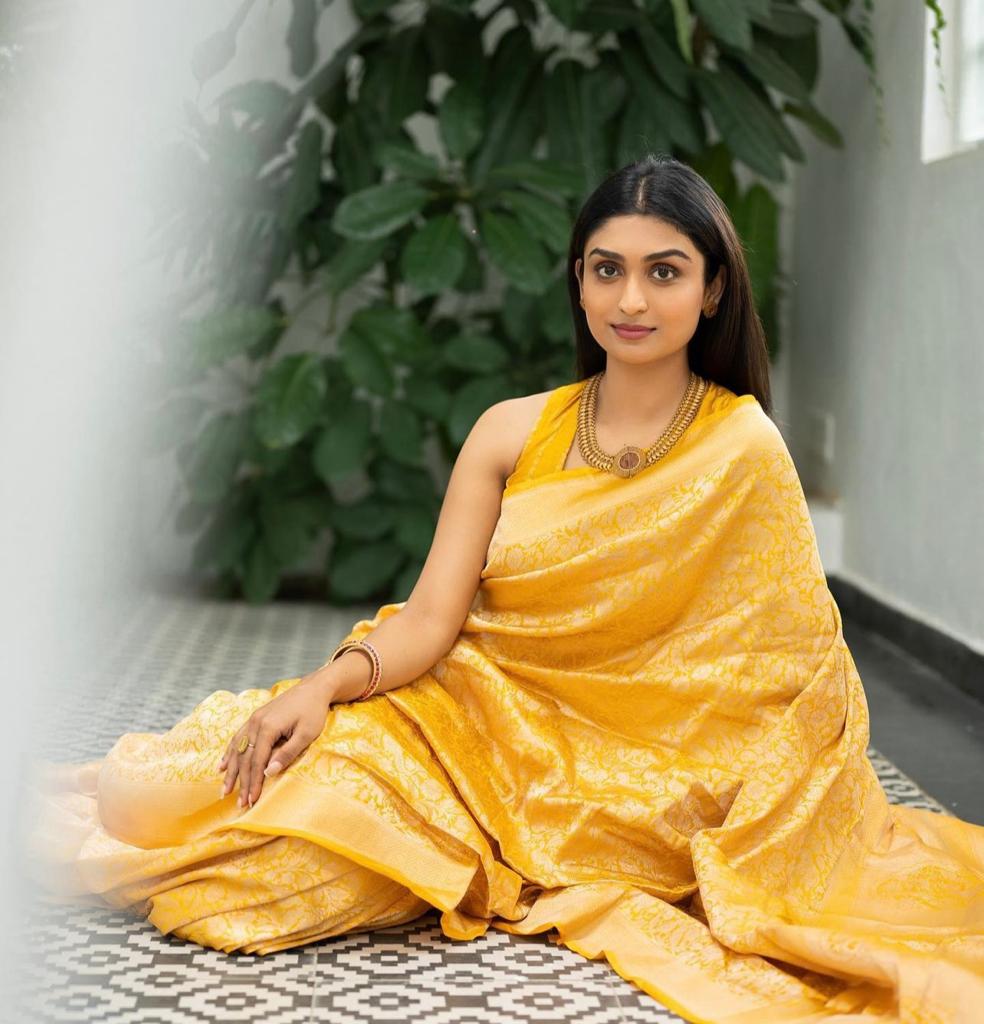 Exotic Yellow Color Soft Lichi Silk Saree With Blouse Piece