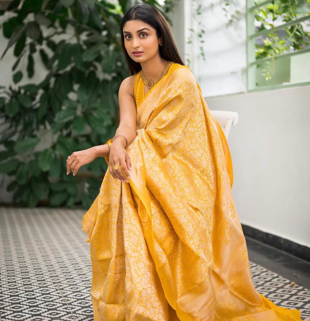 Exotic Yellow Color Soft Lichi Silk Saree With Blouse Piece