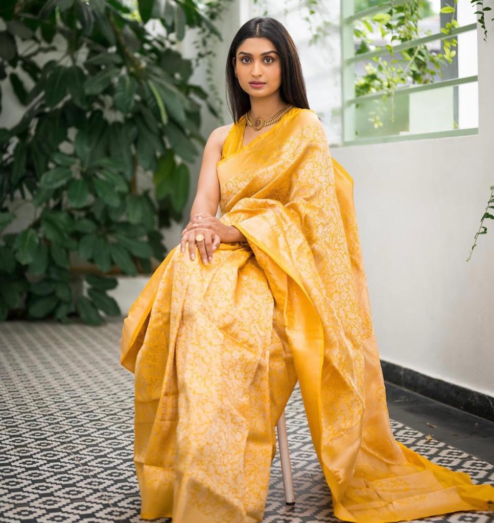 Exotic Yellow Color Soft Lichi Silk Saree With Blouse Piece