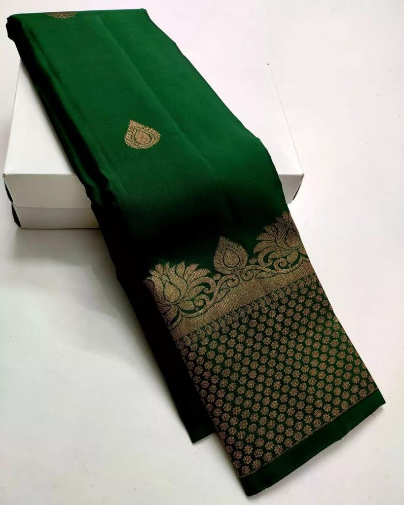 Enchanting Dark Green Color Soft Lichi Silk Saree With Blouse Piece