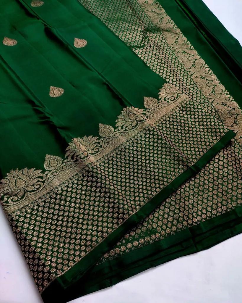 Enchanting Dark Green Color Soft Lichi Silk Saree With Blouse Piece