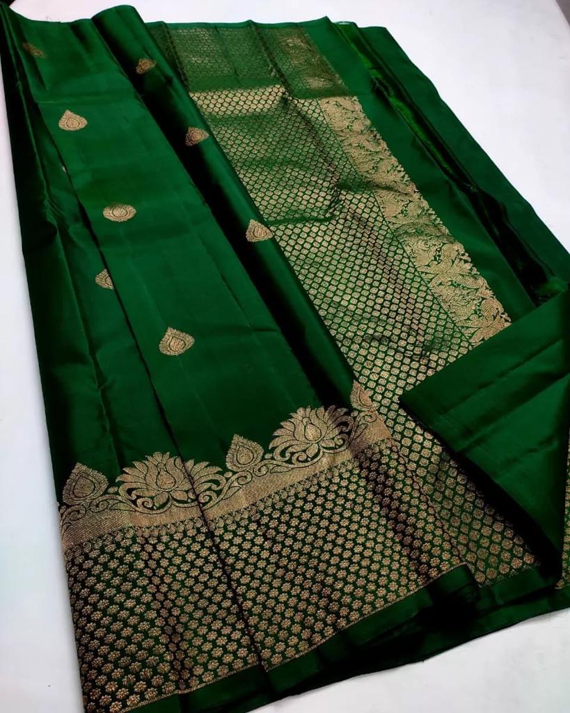 Enchanting Dark Green Color Soft Lichi Silk Saree With Blouse Piece