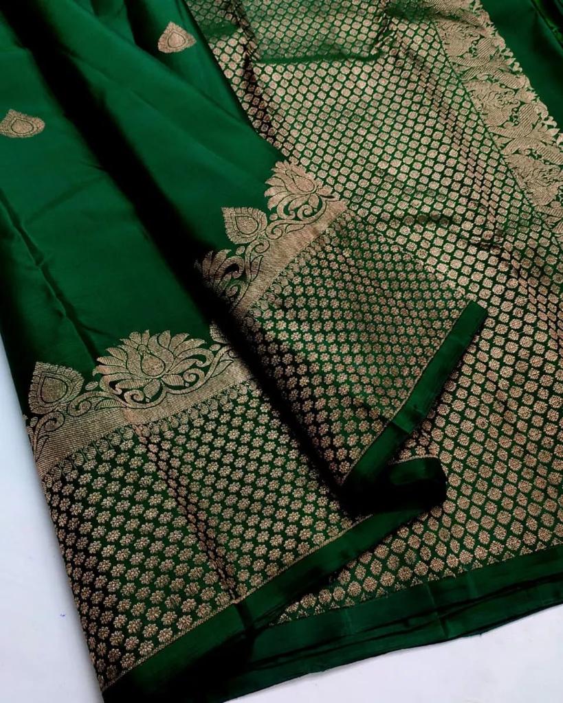 Enchanting Dark Green Color Soft Lichi Silk Saree With Blouse Piece