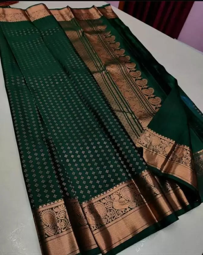 Mystical Dark Green Color Soft Lichi Silk Saree With Blouse Piece