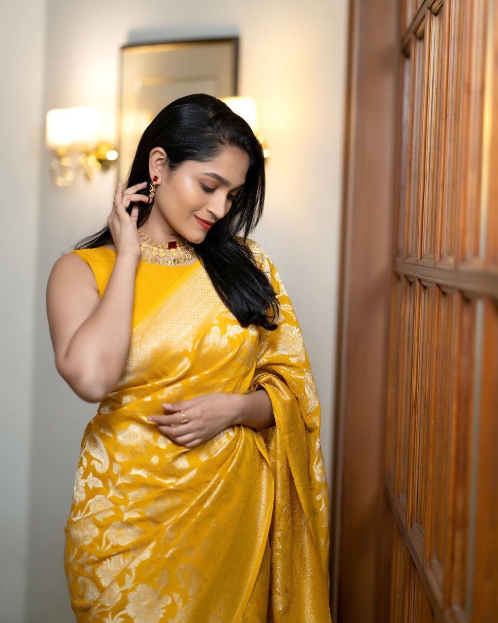 Opulent Yellow Color Soft Lichi Silk Saree With Blouse Piece