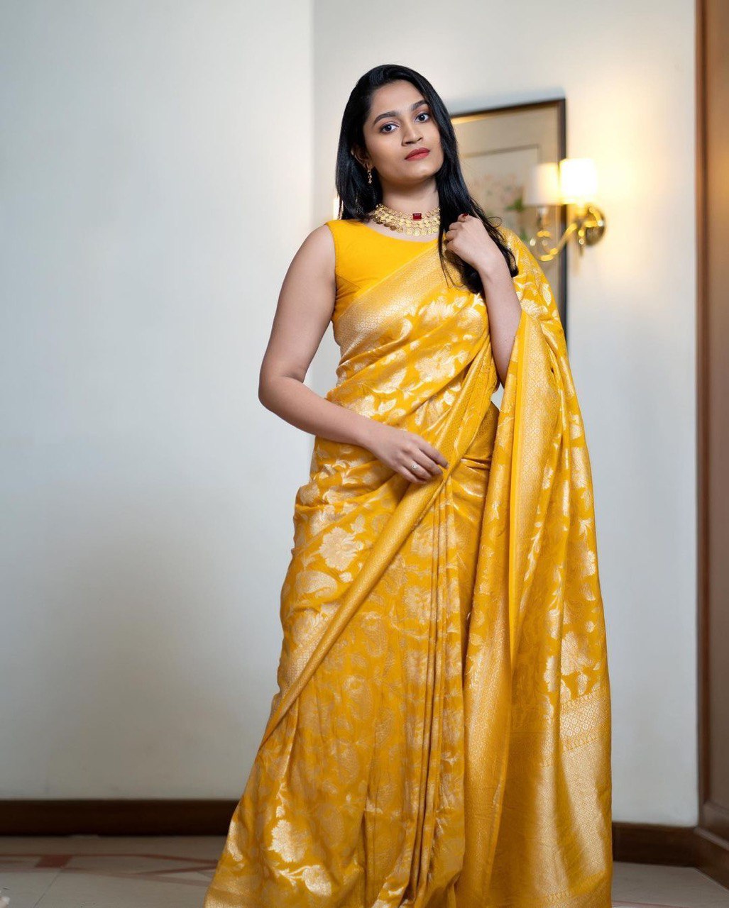 Opulent Yellow Color Soft Lichi Silk Saree With Blouse Piece