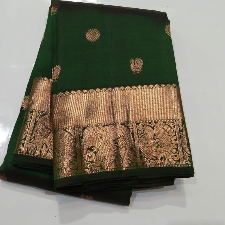 Shimmer Dark Green Color Soft Lichi Silk Saree With Blouse Piece