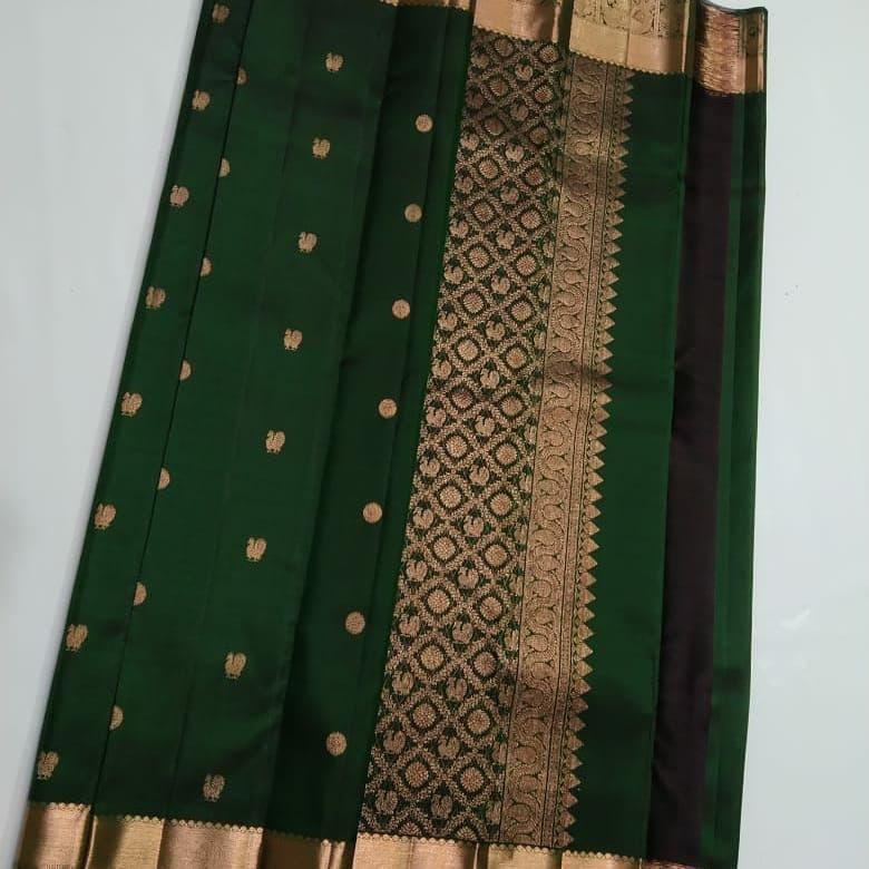 Shimmer Dark Green Color Soft Lichi Silk Saree With Blouse Piece