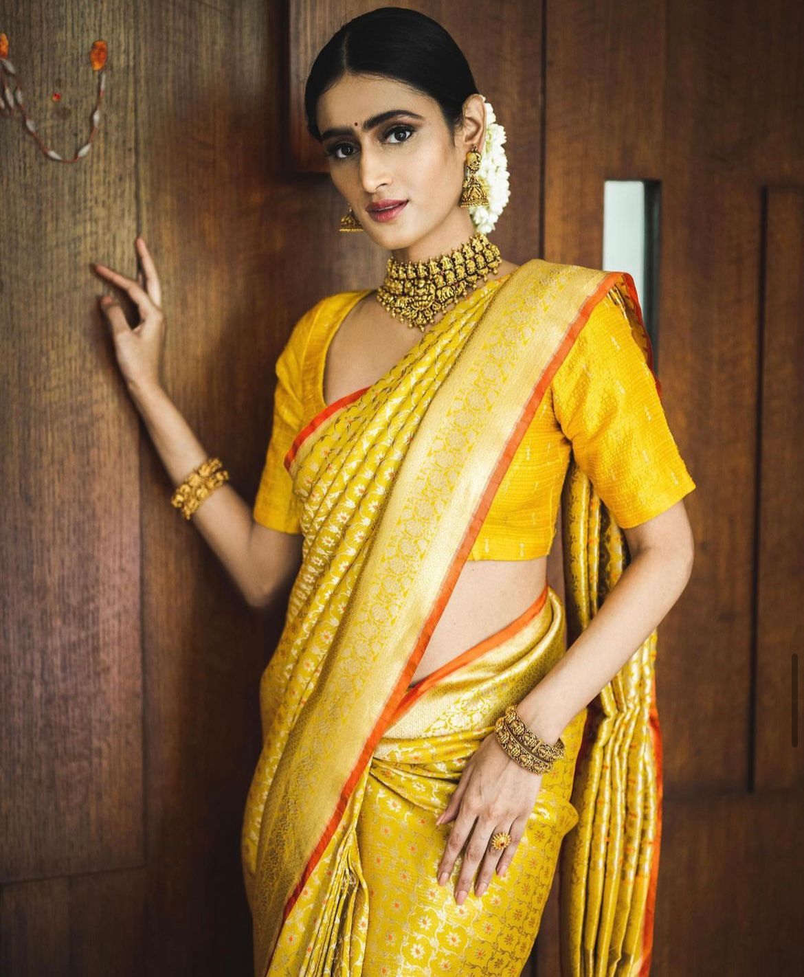 Glamorous Yellow Color Soft Lichi Silk Saree With Blouse Piece