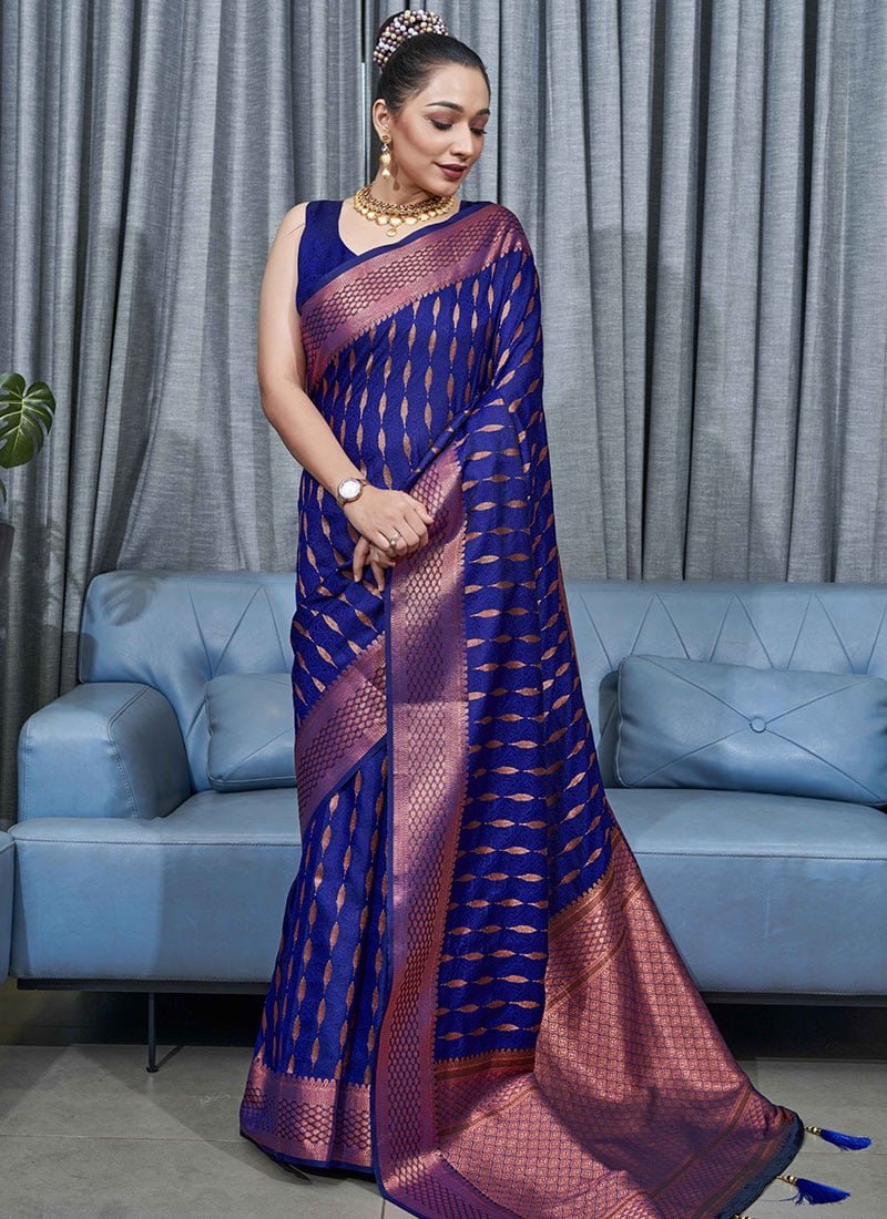 Enchanting Blue Color Soft Lichi Silk Saree With Blouse Piece