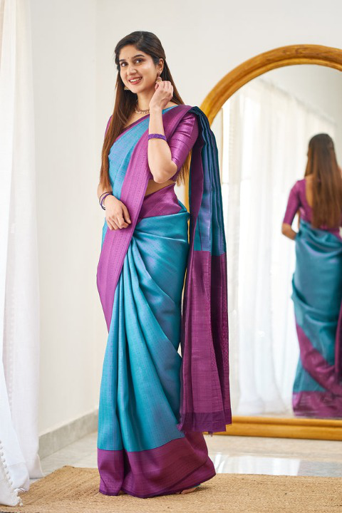 Enchanting Firozi Color Soft Lichi Silk Saree With Blouse Piece