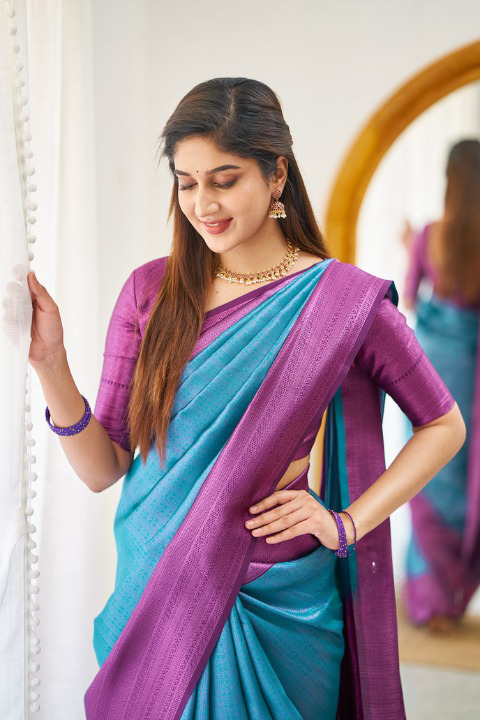 Enchanting Firozi Color Soft Lichi Silk Saree With Blouse Piece