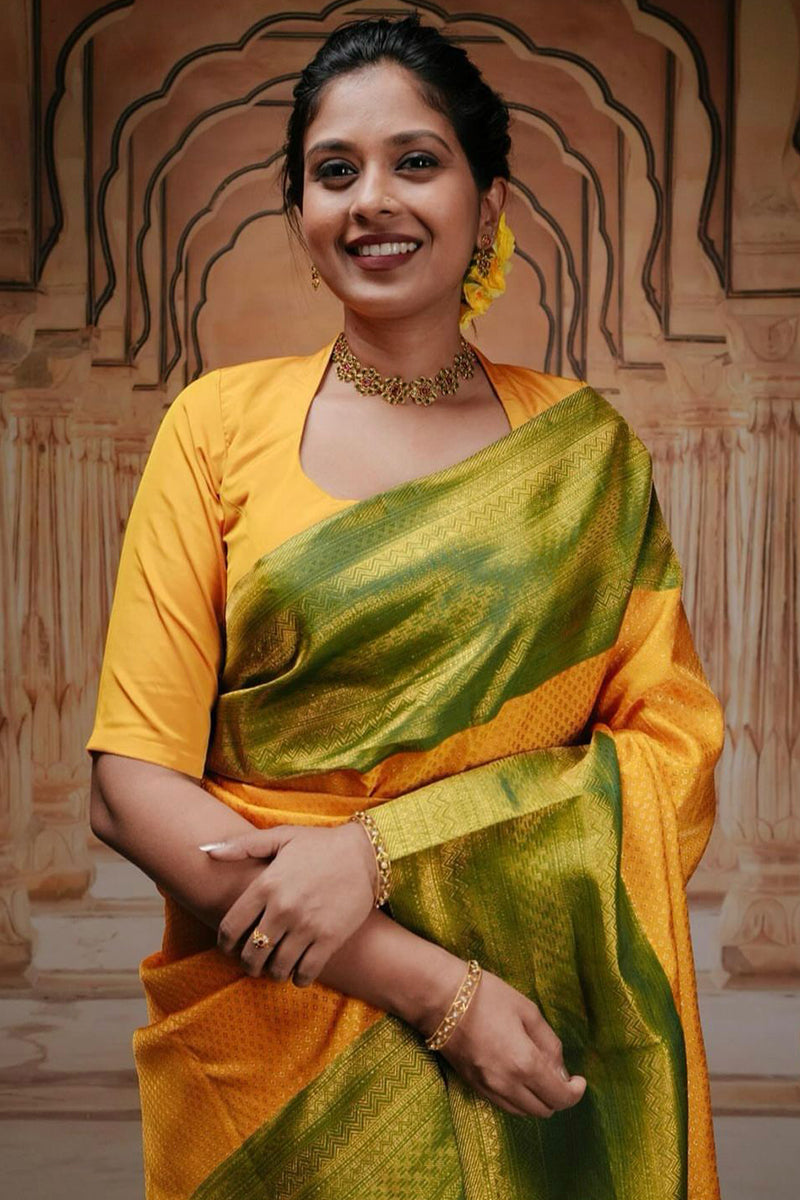 Captivating Yellow Color Soft Lichi Silk Saree With Blouse Piece