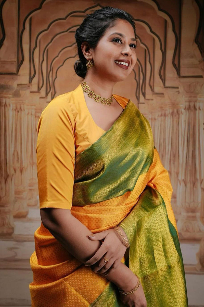 Captivating Yellow Color Soft Lichi Silk Saree With Blouse Piece