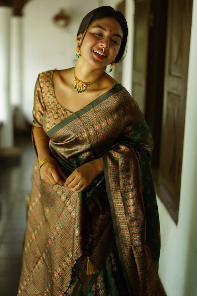 Charming Green Color Soft Lichi Silk Saree With Blouse Piece