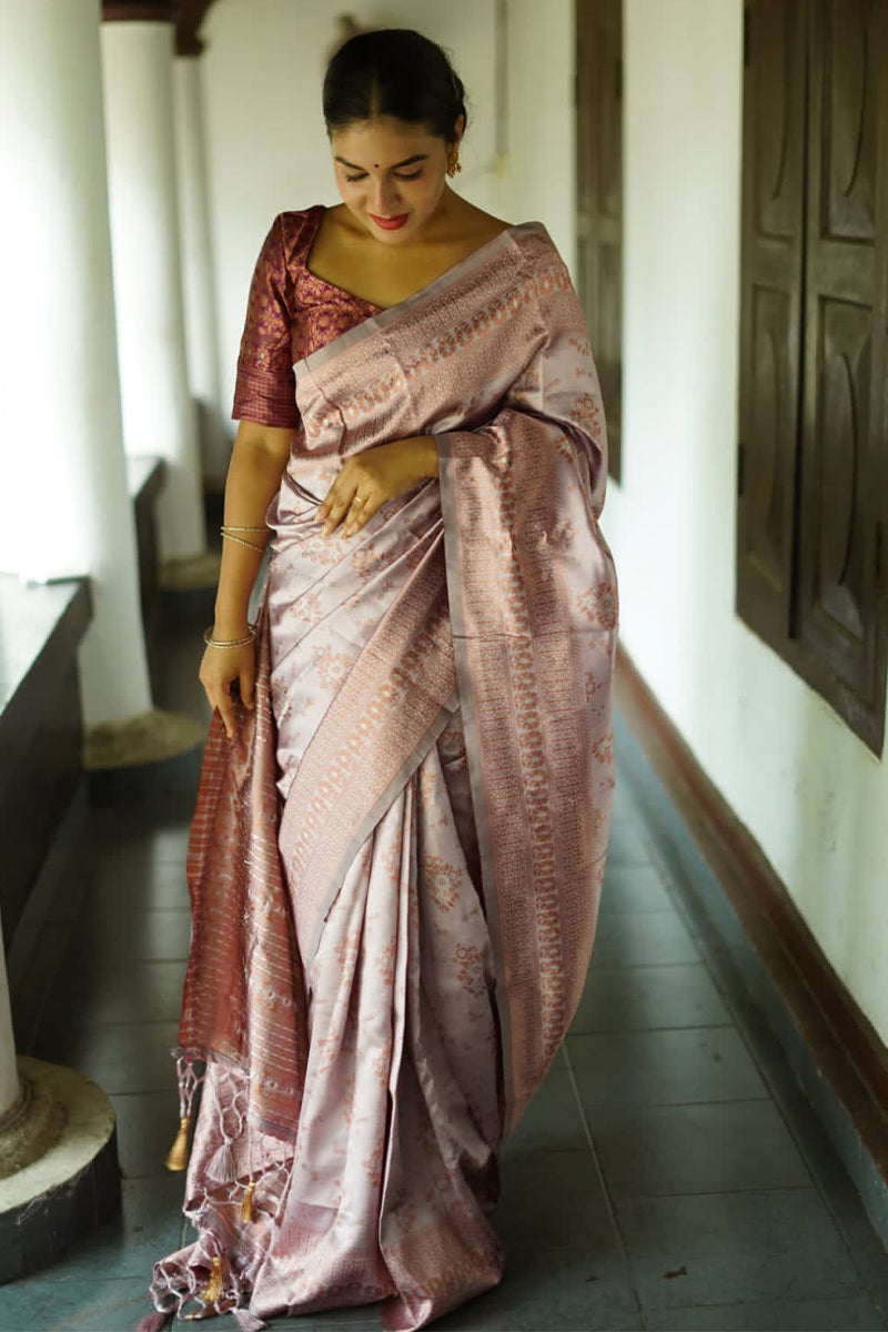 Eye-catching Grey Color Soft Lichi Silk Saree With Blouse Piece