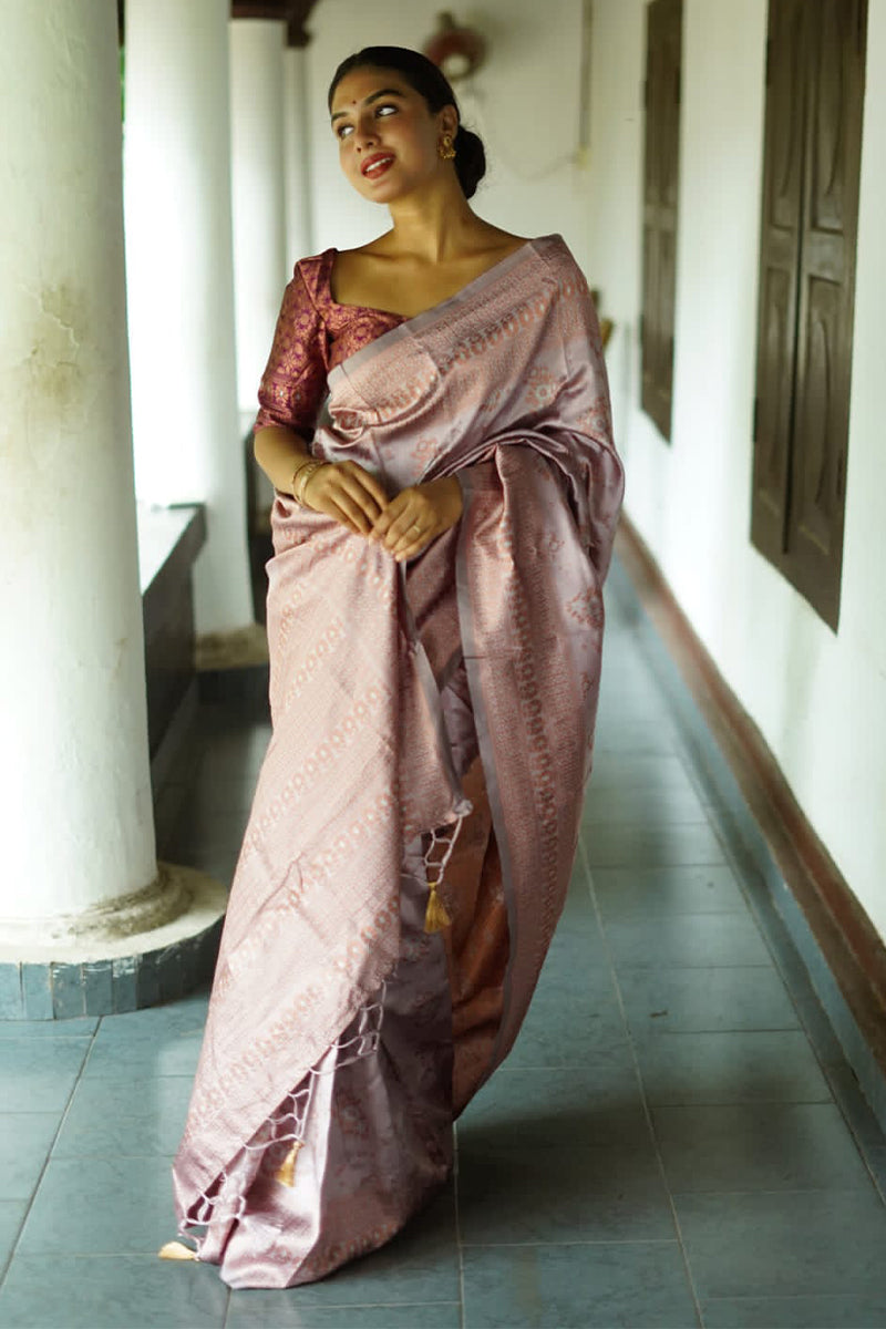 Eye-catching Grey Color Soft Lichi Silk Saree With Blouse Piece