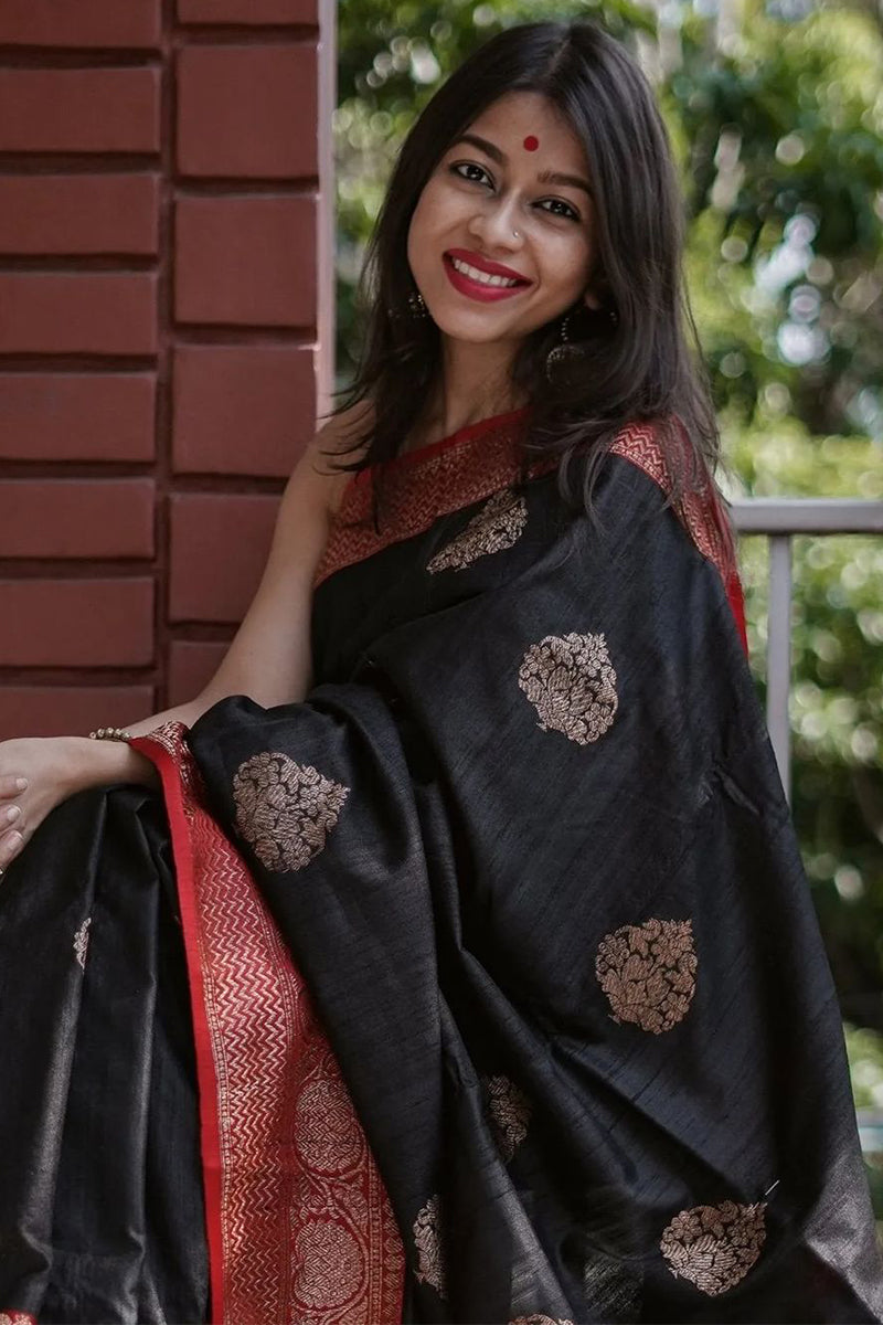 Ecstatic Black Color Soft Lichi Silk Saree With Blouse Piece