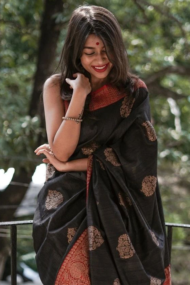 Ecstatic Black Color Soft Lichi Silk Saree With Blouse Piece