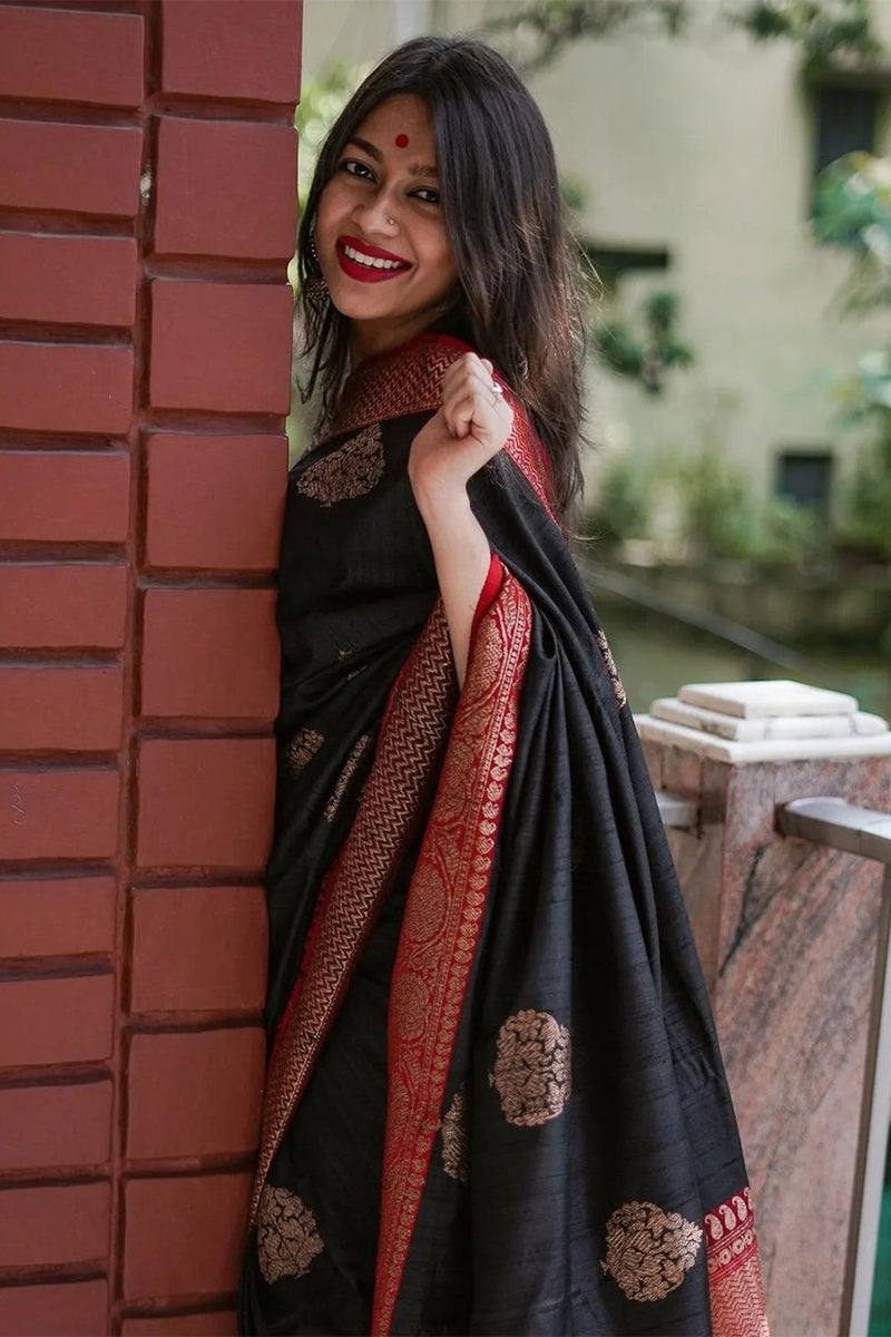 Ecstatic Black Color Soft Lichi Silk Saree With Blouse Piece